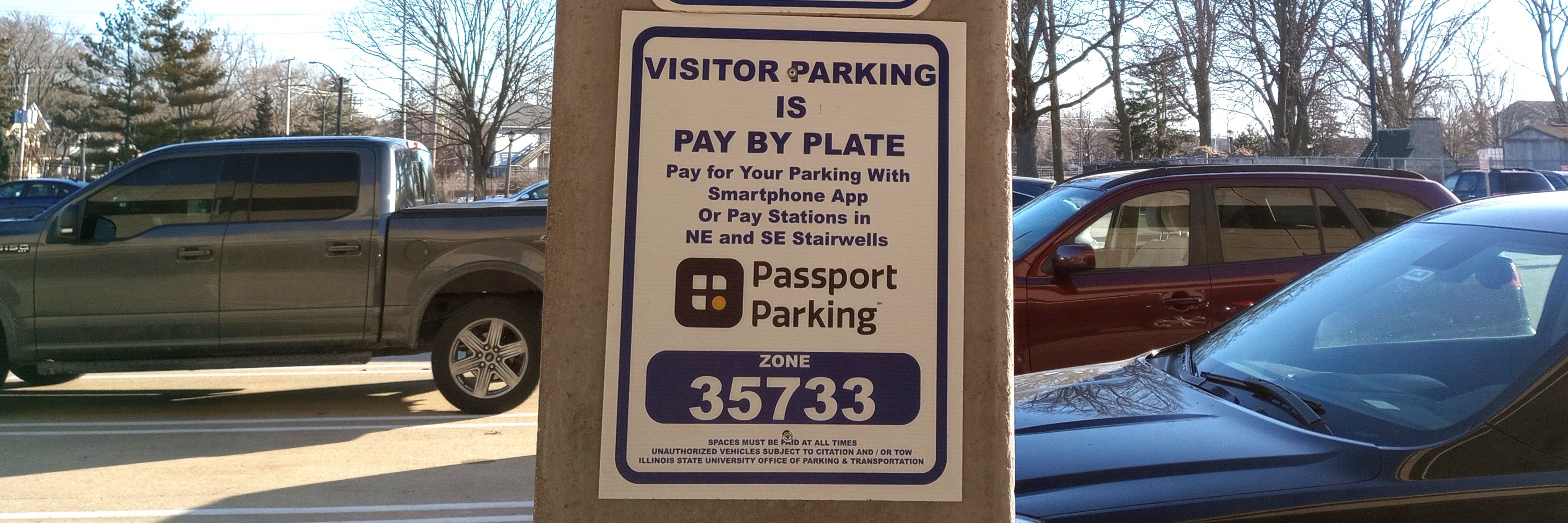 Photo of Paid Visitor parking sign.