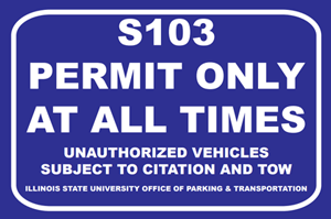 A blue S103 Student Storage parking lot sign with Text: S103 PERMIT ONLY AT ALL TIMES, UNAUTHORIZED VEHICLES SUBJECT TO CITATION AND TOW, ILLINOIS STATE UNIVERSITY OFFICE OF PARKING AND TRANSPORTATION